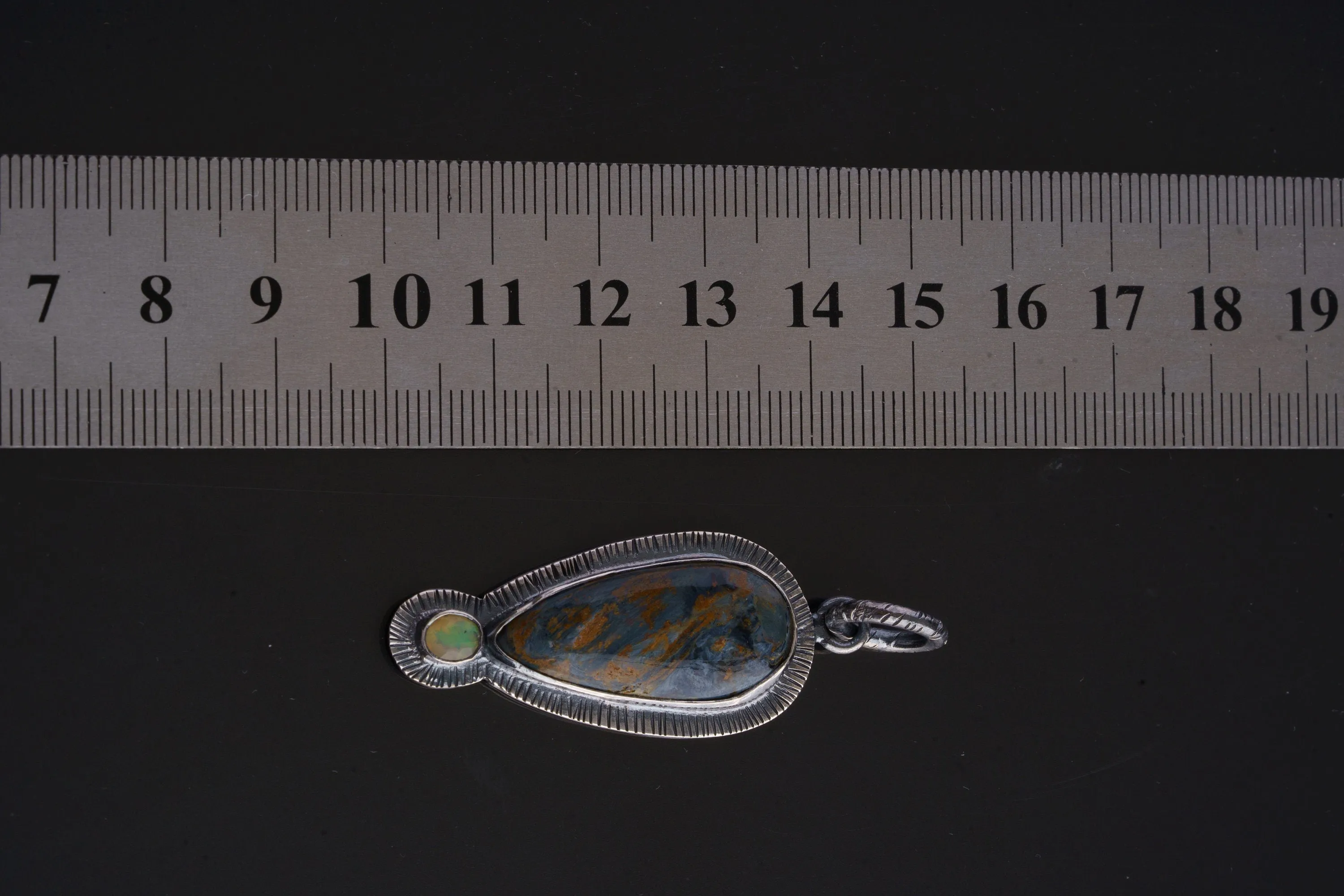 Tempest Horizon - A Stunning Fusion of Pietersite's and Ethiopian Opal Pendant - Oxidised Sterling Silver with Sun Ray Details